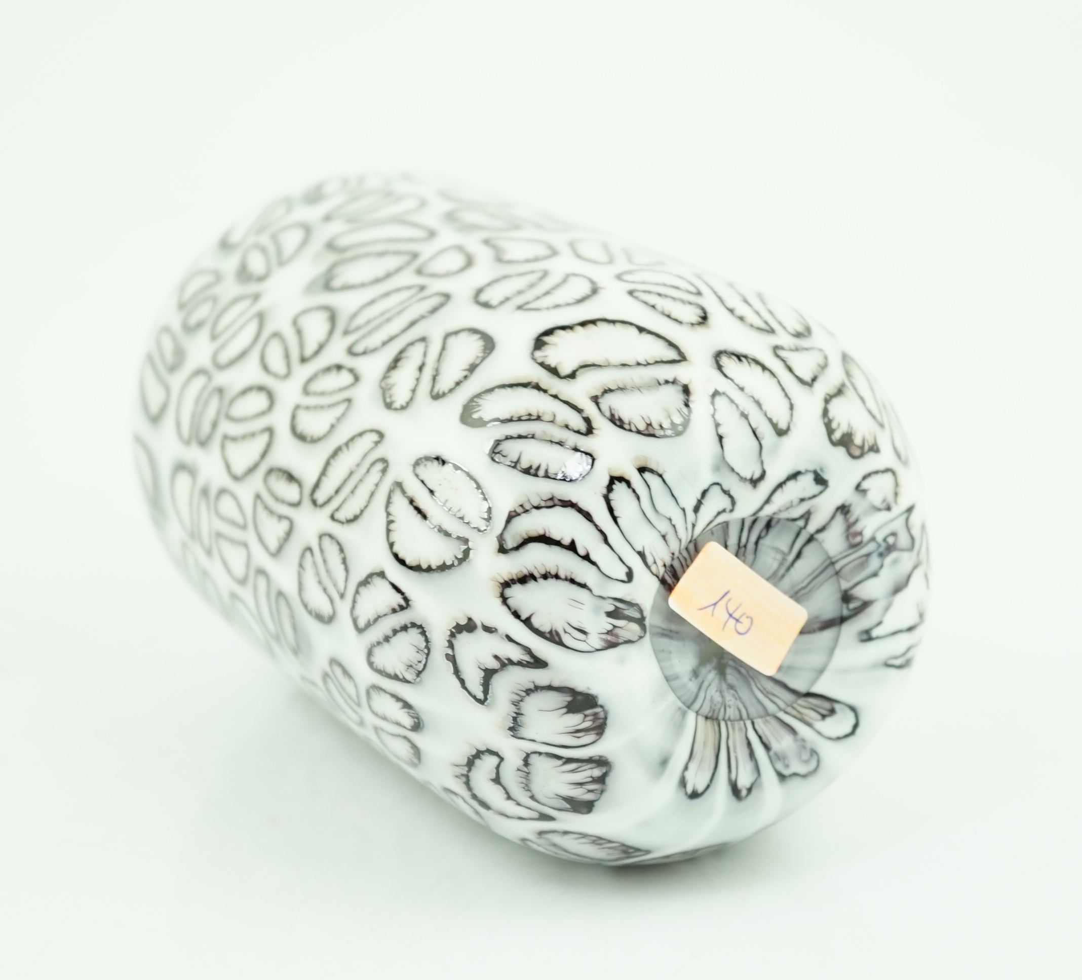 Vittorio Ferro (1932-2012) A Murano glass Murrine vase, with black segments on a white ground, signed, 17cm, Please note this lot attracts an additional import tax of 20% on the hammer price